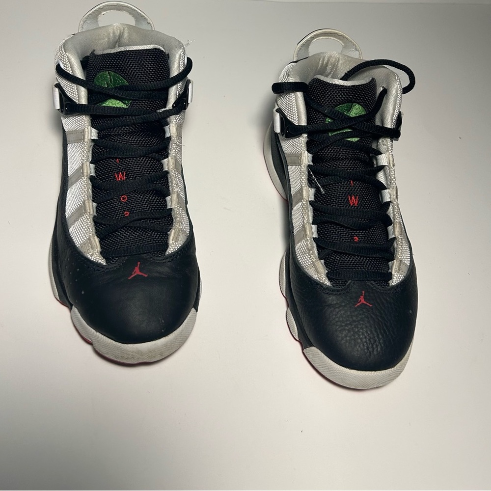 White black and red pair of six rings air Jordan’s
